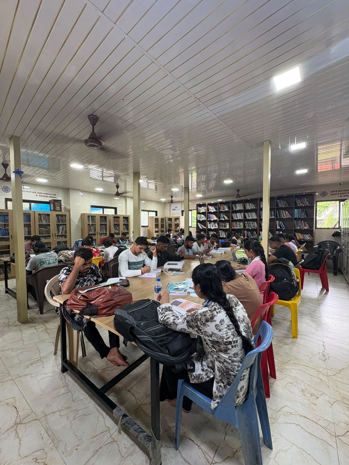 Students studying at the DBM India Empower Library cum Study Centre